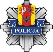 gwiazda policyjna z herbem województwa i napisem policja