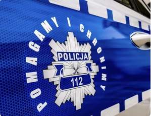 Napis "Pomagamy i chronimy" z policyjną gwiazdą.